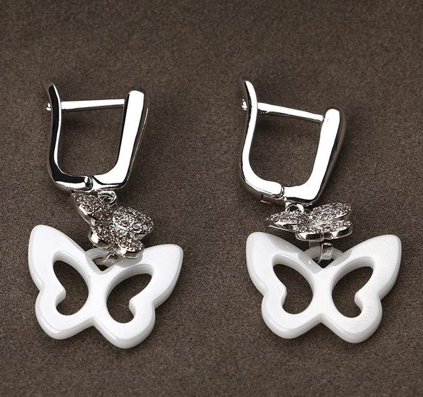 

hanging butterfly earrings set with bling crystal black white ceramic fashion temperament korean earrings fashion01, Golden;silver
