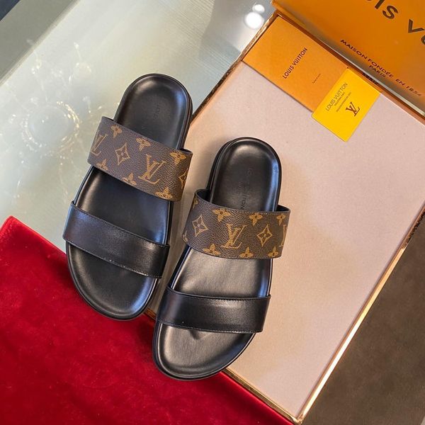 

1a5s87honolulu mule combining black calf leather with dark-gray damier graphite canvas, the honolulu mule evokes an outdoor spirit with its2