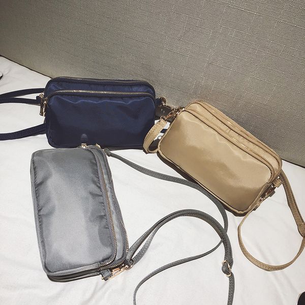 

fashion lady solid color nylon waterproof shoulder bag new all match crossbody bag multi-layer practical change mobile phone