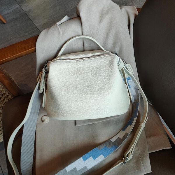 

2020 white summer solid color soft cowhide leather women's handbag roomy wide strap female shoulder bag all-match totes