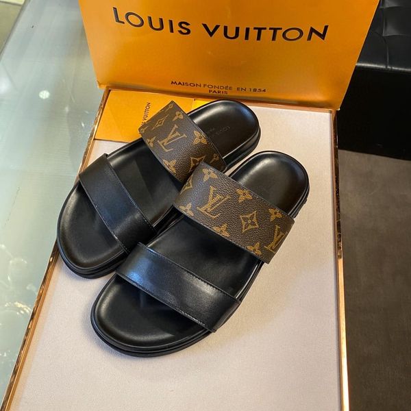 

1a5s87honolulu mule combining black calf leather with dark-gray damier graphite canvas, the honolulu mule evokes an outdoor spirit with its1