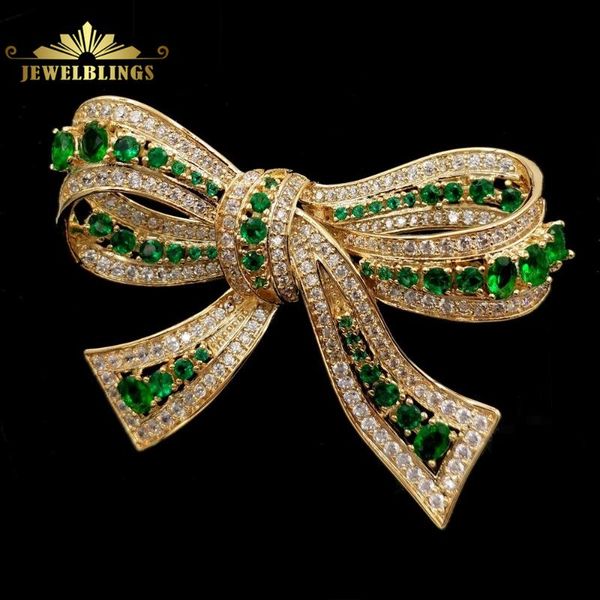 

edwardian vintage micro pave cz green bowtie brooches gold tone framed oval stones prong-set antique green bow knot pin broaches, Gray