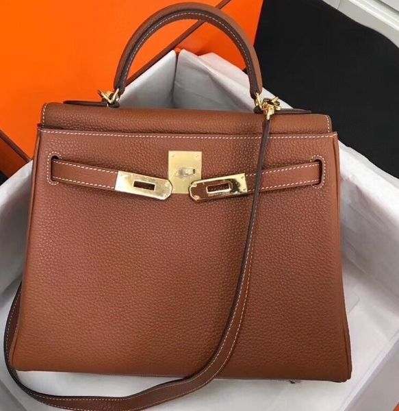 

whosale desgn keiily purse size 25 28 32cm for chosen,calf skin machina made,have gold and silver hardware,contact me for details
