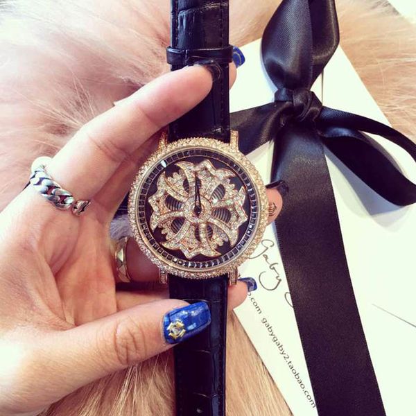 

wristwatches mashali brand fashion luxury women quartz watches lady shining rotation dress watch big diamond stone clock, Slivery;brown