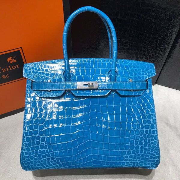 

only 1pcs in stock,whosale fully handmade blue thailande crocodile skin brand handbag 30cm,made by 3.5pcs crocodile,ontact me for details
