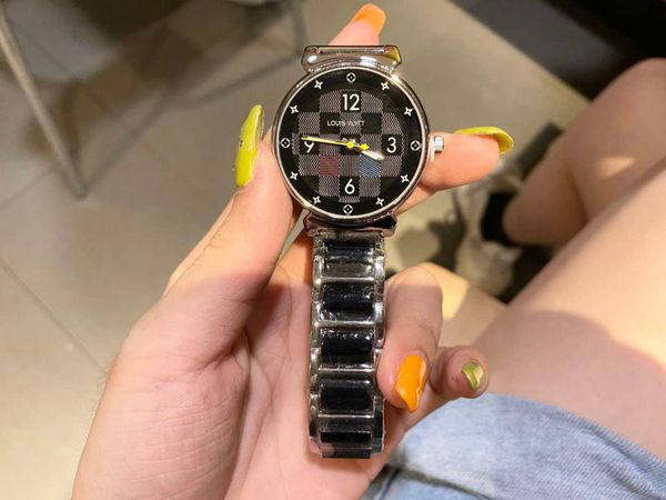

selling new ladies watch temperament fashion simple ceramic leather strap authentic watch, Slivery;brown