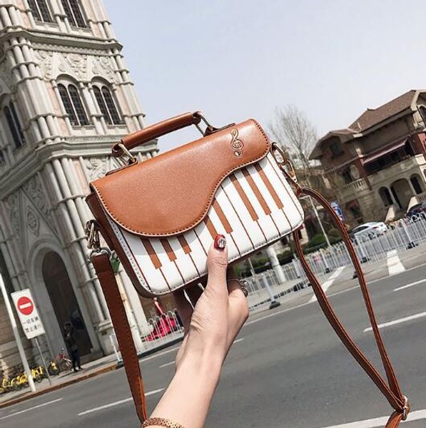 

дизайнер-pu новый стиль модные пианино плеча сумки trip вышивки примечание сумки ключевая особенность свежее плеча сумки школьные сумки