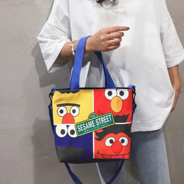 

bag female new cute wild canvas bag portable messenger