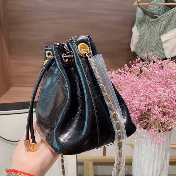 

сеть высокого качества bucket кулиской посланник crossbody женщины кожа дамы сумки на ремне, масло воск шаблон материал