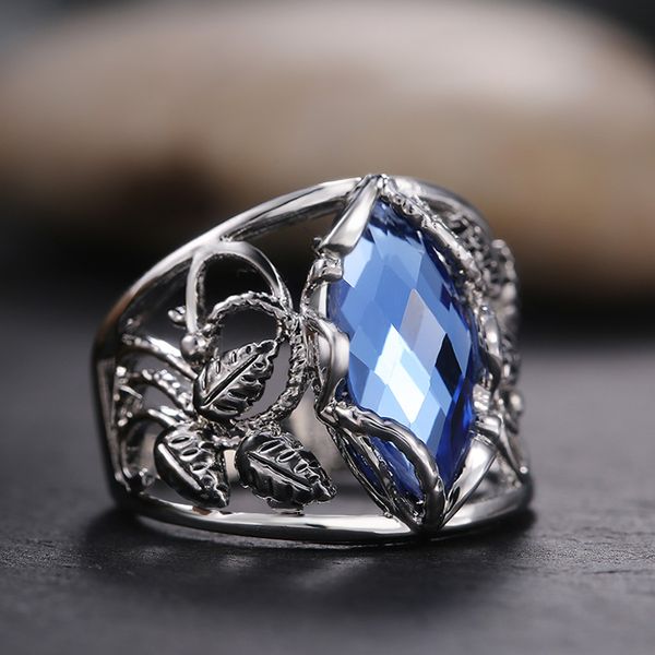 

Junerain Brand Fashion Wide Women Ring for Party Daily Wearable Jewelry Noble Rhombus Cut Blue Horse Eye Drill Stone Hollow Leaf Rings