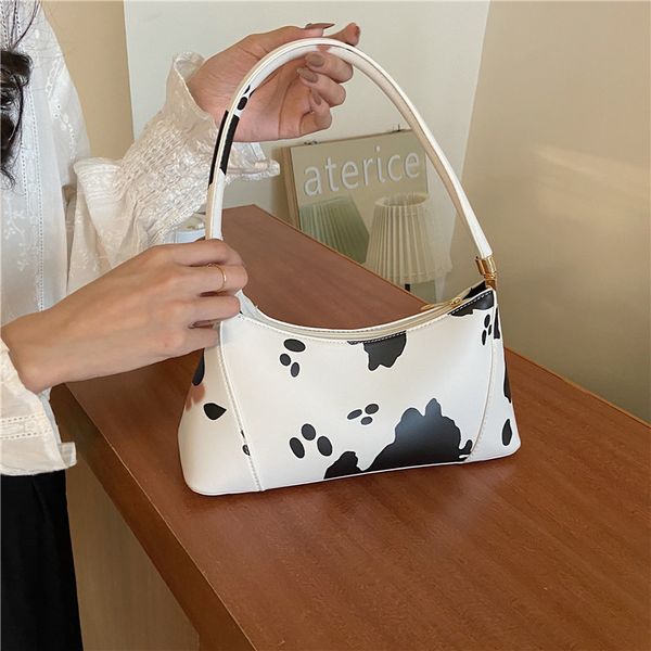 

vintage cow pattern pu leather ladies handbags luxury design women's armpit shoulder bags female retro baguette bag clutch purse