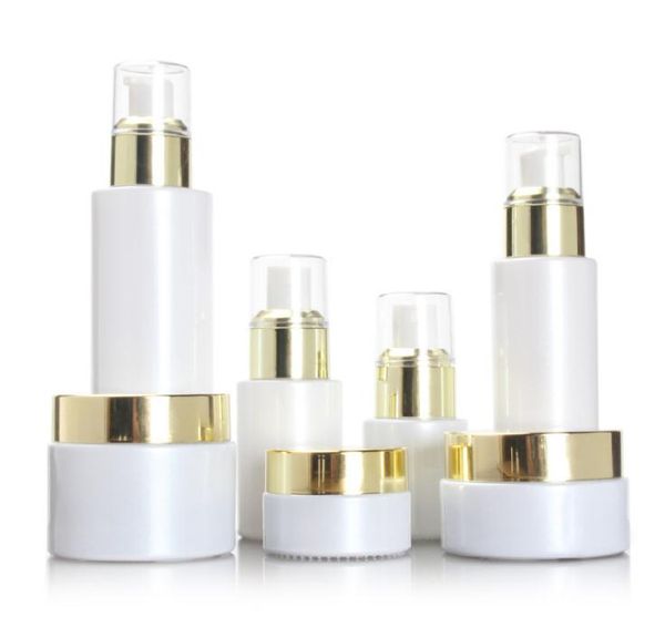 

empty 20/30/100ml white glass pump lotion/spray bottle gold collear lids sn521