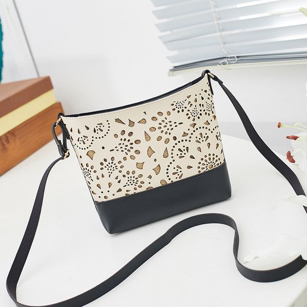 

carved one-shoulder bucket-type stray bag new coin change mobile phone bag ladies hand bags