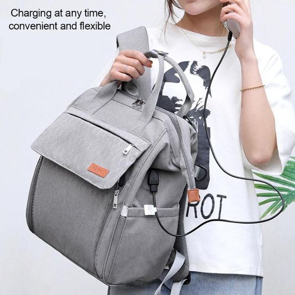 

new fashion mummy maternity nappy bag large capacity backpack with 4 built-in bottle compartments travel baby care nappy bag