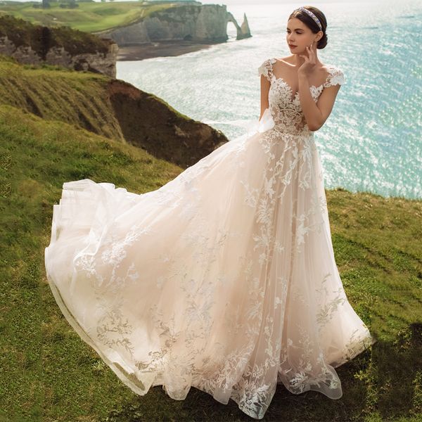 

scoop lace appliques wedding dresses 2021 tulle cap sleeve buttons beadings bridal gowns vestidos de novia, White