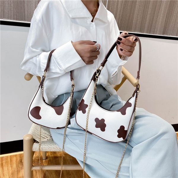 

cow pattern crescent shape design shoulder bags for women 2020 new small baguette cute cross body bag travel handbags purse