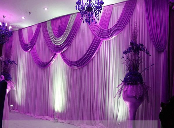 

luxury wedding backdrop with beatiful swag wedding drape and curtain decoration
