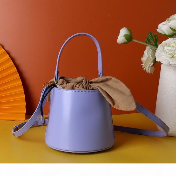 

8760# mini size leather handbags 2020 new bucket bag lady suede shoulder bag fashion wild rabbit ears handbags