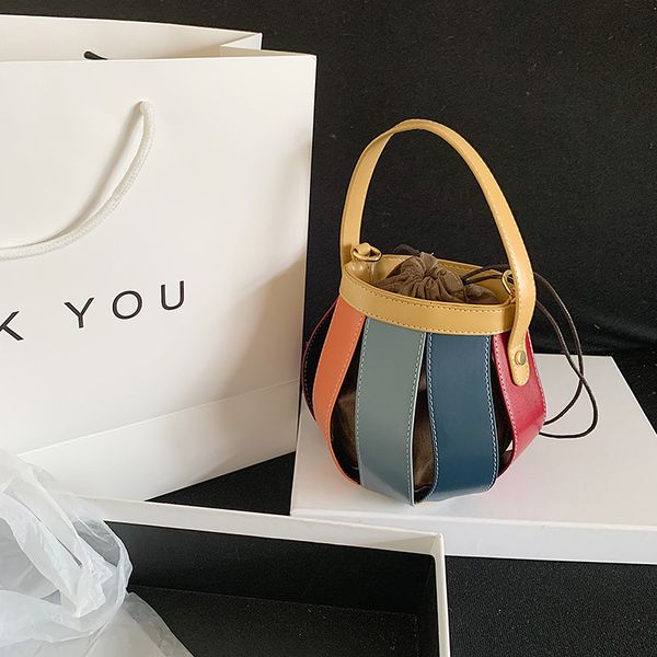 

new summer unique mini bag line new women's fashion handbag messenger bag portable bucket