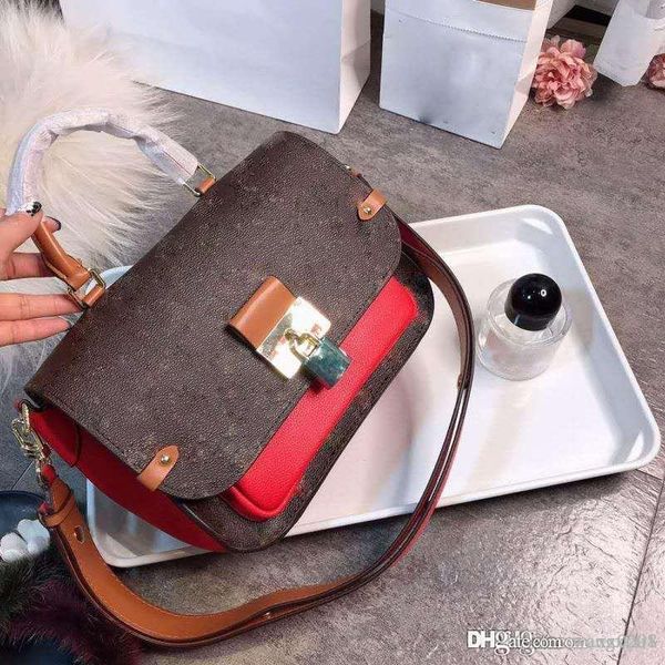 

old calfskin decorative edge color matching women's bag, with large lock fashionable all-around postman bag handba
