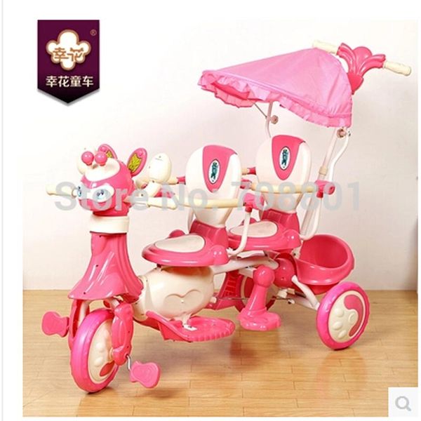 

xinghua cartoon twins trike with steel frame and pp part kids tandem tricycle