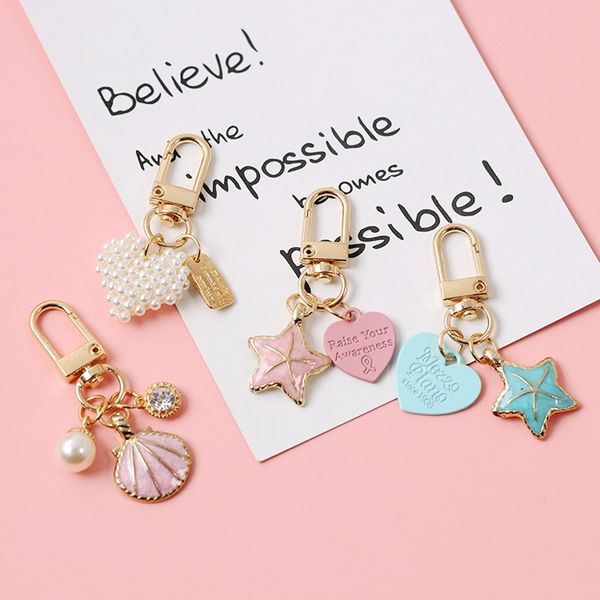 

minimalist beach wind keychain shell starfish shape metal pendant keychain men and women fashion jewelry wholesale friends gift, Silver