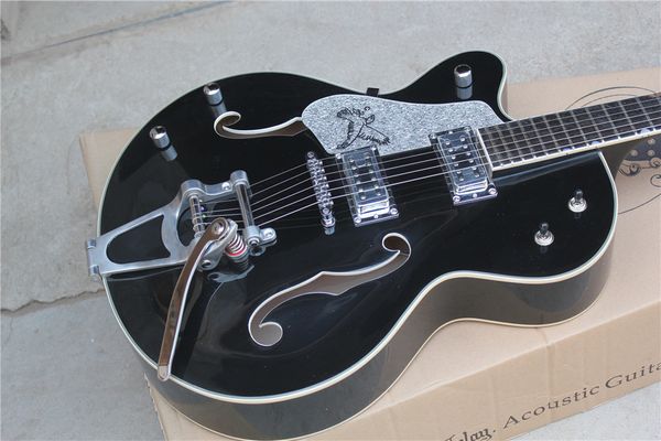 Chitarra elettrica nera cava per mancini personalizzata di fabbrica con hardware cromato, sistema tremolo, rilegatura bianca, personalizzabile