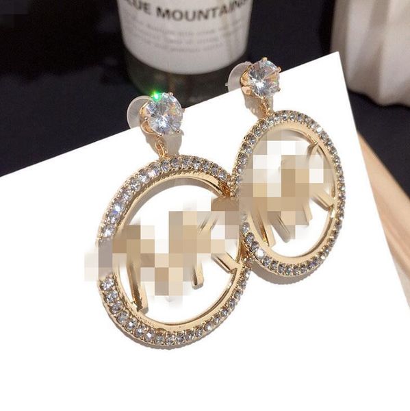 

korean version of the new character letter earrings oversized zircon texture metal fairy silver needle earrings, White