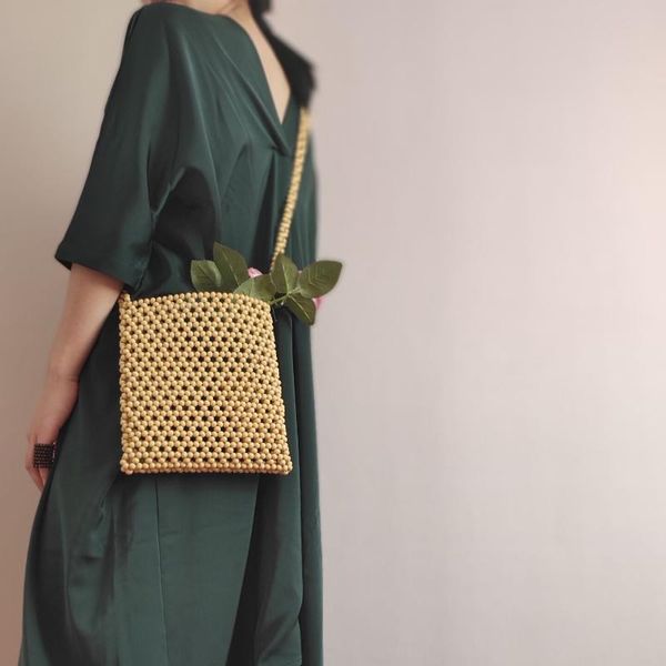 

21x23cm natural wood beads fancy woven hollow messenger bags a5965