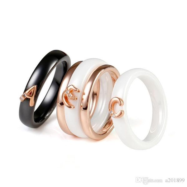 

black/white ceramic letter ring men and women rose gold couple ring, Golden;silver