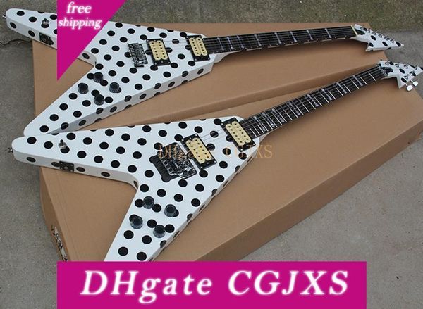 

white v shaped electric guitar with black dot ,floyd rose ,rosewood fretboard ,can be customized as reques