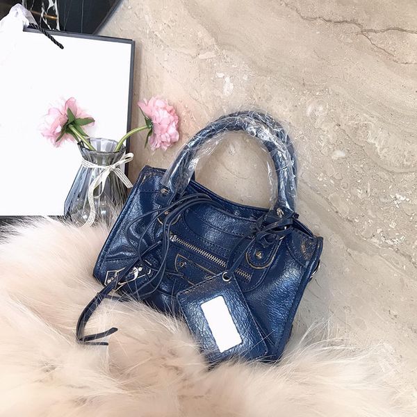 

classic vintage tassel chain city lady real leather handle shoulder bag studs rivet solid rivets medium motorcycle vintage bag