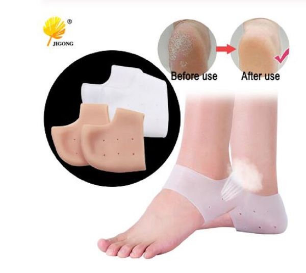 

new arriver feet care socks 1pair=2pcs new silicone moisturizing gel heel socks cracked foot skin care protectors anti cracking