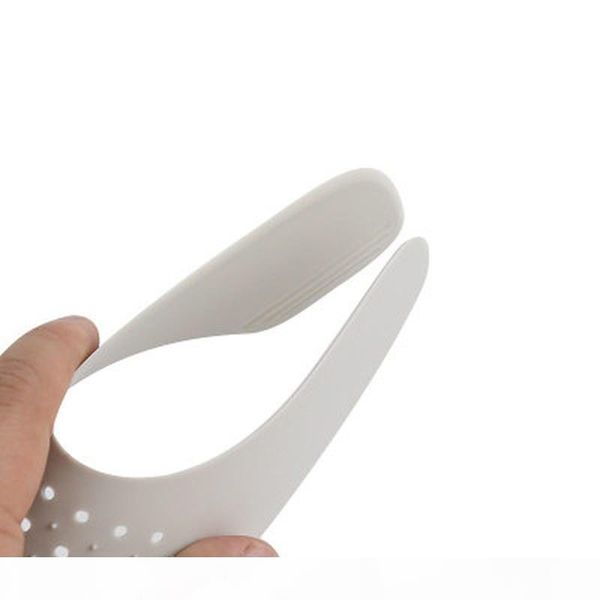 

shoes shields for sneaker anti crease wrinkled fold shoe support toe cap sport ball shoe head stretcher shaper keeper tree, White;pink