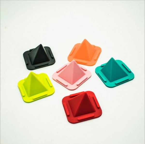 

cgjxscreative new multi -function non -slip mat plastic pyramid lazy person desknon -slip pad flat phone bracket