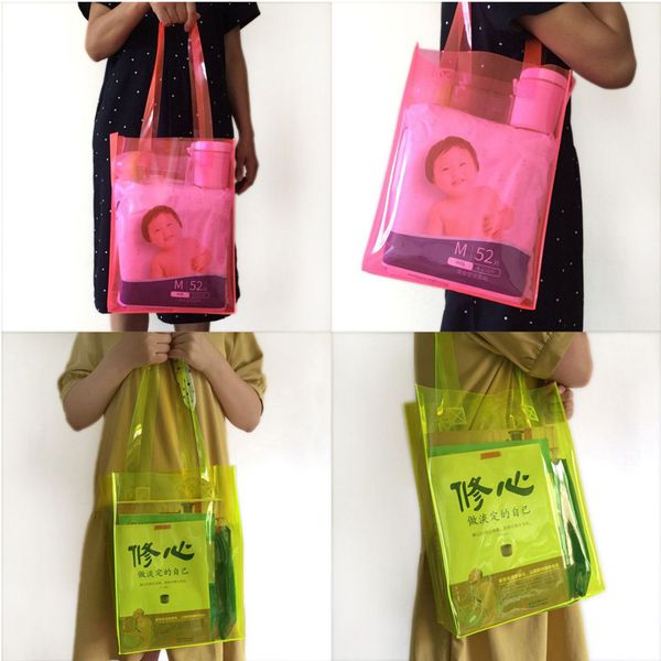 

100pcs/lot yellow pink blue transparent tote bag gift bag hand plastic waterproof gift package shopping wholesale