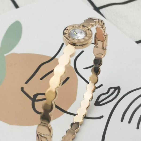 

a large drill wave european and american classic brands luxury women bangle steel, Black