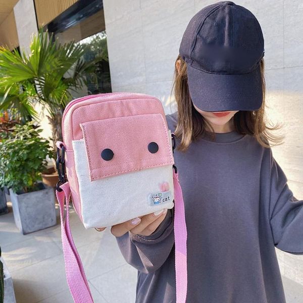 

2020 new women's embroidered canvas handbag buckle creative cartoon shoulder bag