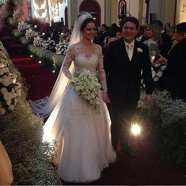 

2020 princess fashion white ivory lace illusion backless beaded long sleeves bride back pearls buttons bridal ball gown bride dresses