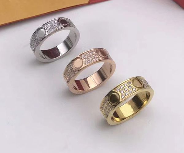

titanium stainless steel men's and women's jewelry ring cubic zirconia gold and silver rose gold ring red package 4mm 6mm