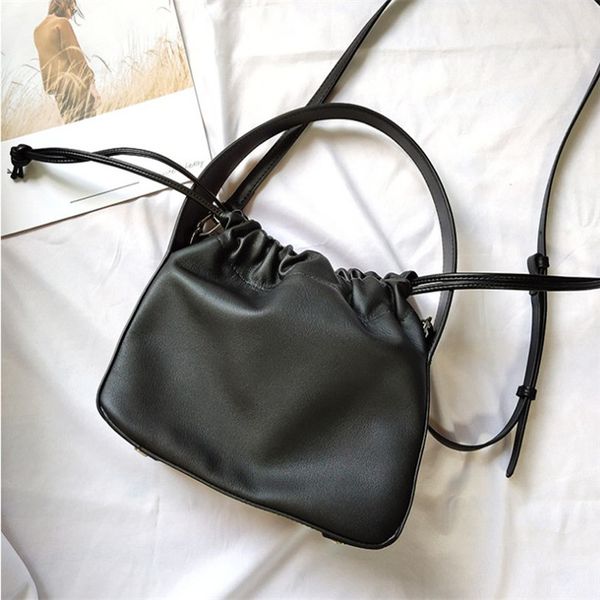 

fashion brand design handbags, high-quality autumn and winter new style black drawstring cowhide hundred matching casual messenger bag