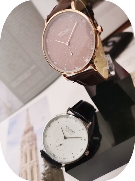 

новый номос бренда часы немецкого дизайнера кварц кожа роскошных часов для мужчин и женщин, Slivery;brown