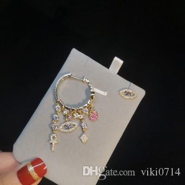 

fashion asymmetry eye lucky charm zircon earrings, Golden;silver