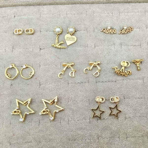 

d home/di home 2020cd letter earrings female star round bird internet celebrity temperament female bronze earrings one to one, White