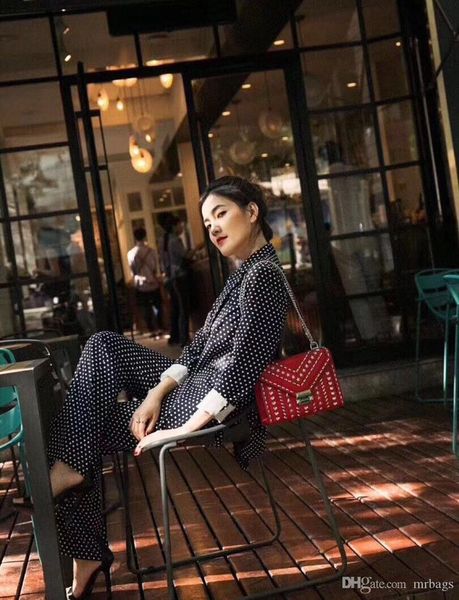 

selling women's handbags american designer shoulder bag star with a high-end custom fashion style rivet pattern decoration