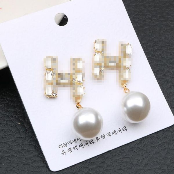 

earrings female temperament korean personality simple bow earrings super fairy web celebrity 925 silver needle versatile pearl earrings, White