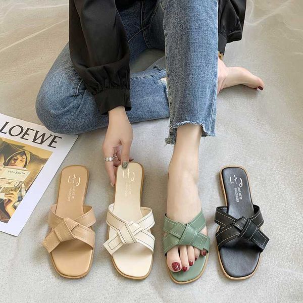 

fairy slippers female wind in the summer of 2020 the new word cool slippers female fashion wears outside joker flat bow, Black