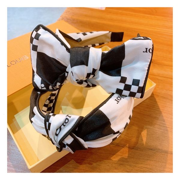 

Signature Chinese style black and white bow hairband hairpin headwear
