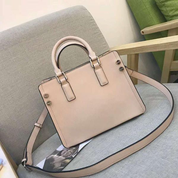 

korean version of simple solid cowhide handbag fashion tot joker hand bill of lading shoulder handbag