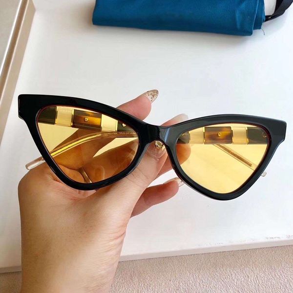 

2020 luxury designer sunglasses for fashion oval simple uv 400 lens coating mirror lens color plated frame come with package gg0597s